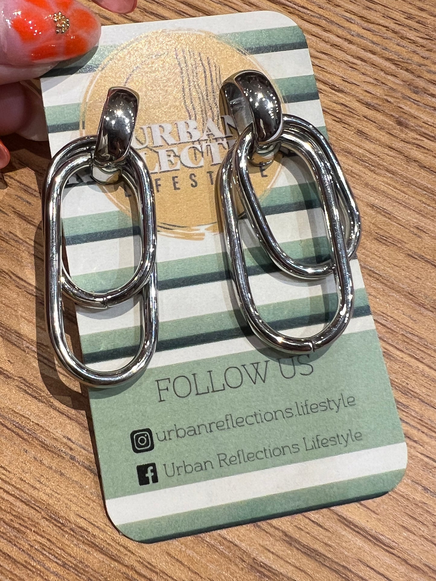 WP silver tone earrings